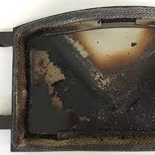 Why can't i get my ceramic wood stove glass clean? - Total Hearth